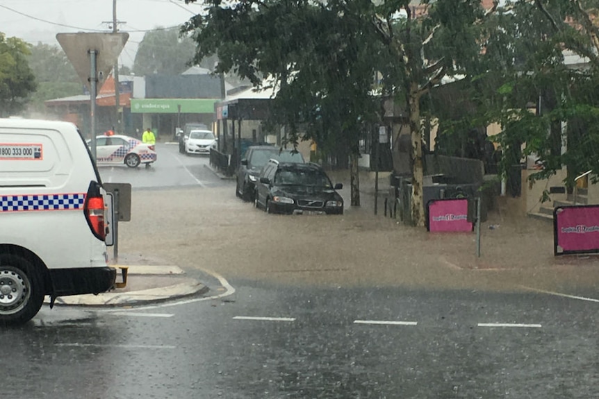Floodwaters cover part of the road in Rosalie, Brisbane.