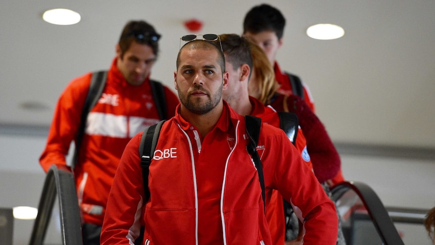 Flat feeling ... Swans forward Lance Franklin arrives at Sydney domestic airport on Sunday