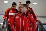 Flat feeling ... Swans forward Lance Franklin arrives at Sydney domestic airport on Sunday