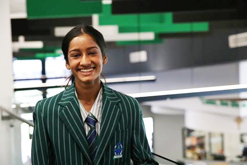 Smiling photo of Rockhampton Year 12 graduate Ridhi Beotra in her school uniform.