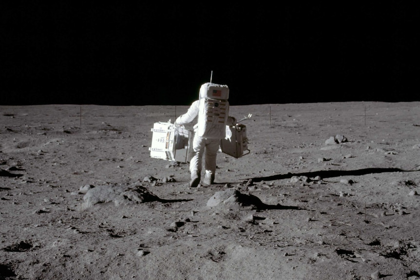 An astronaut walking on the Moon