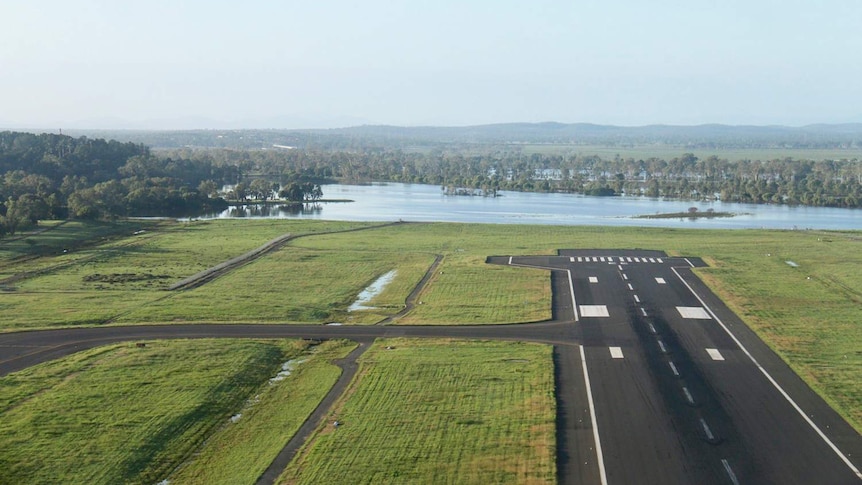 Floodwaters creep closer to the Rockhampton Airport runway on April 2, 2017