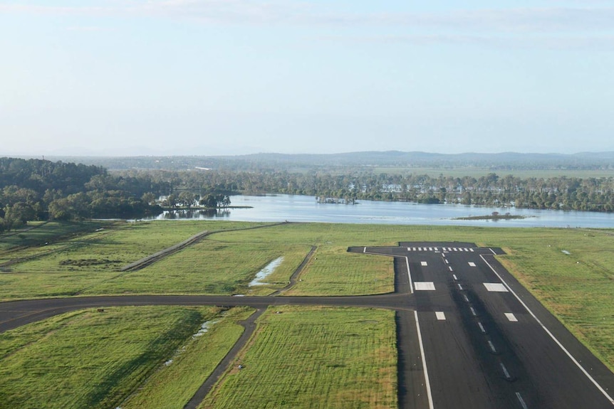 Floodwaters creep closer to the Rockhampton Airport runway on April 2, 2017