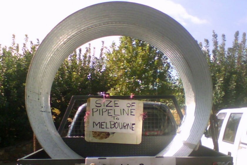 Protesters opposed to the north-south pipeline march on farm where pipe is being laid.