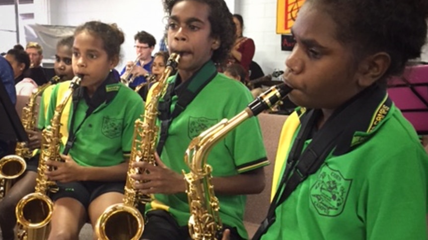 Young Aboriginal girls play saxophone