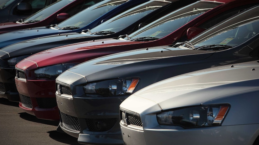 Cars sit at a vehicle dealership at Mount Gravatt in Brisbane.