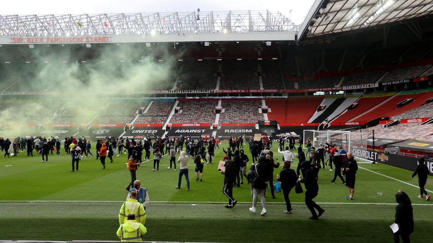 ‘Get out of our club’: Angry Manchester United fans invade Old Trafford to demand club’s owners exit