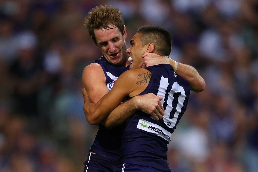 Michael Barlow and Michael Walters celebrate a goal against Port Adelaide