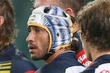 Cowboys look on after a Roosters try