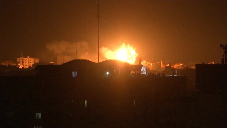 An Israeli air strike hits Hamas's al-Aqsa TV station in the Gaza Strip
