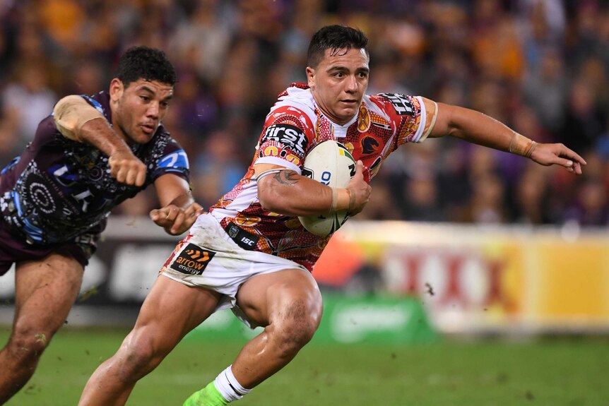 Kodi Nikorima streaks away from Manly