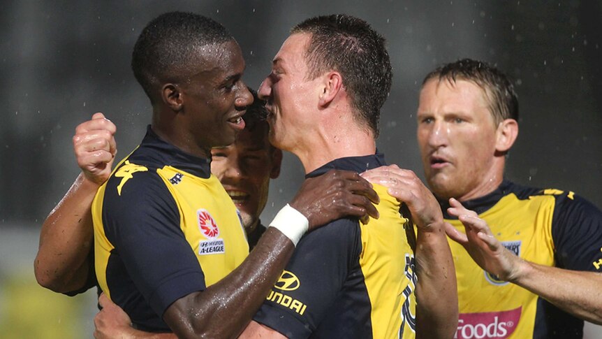 At the double ... Mitchell Duke lifted the pressure off of Central Coast with two goals against the Melbourne Victory.