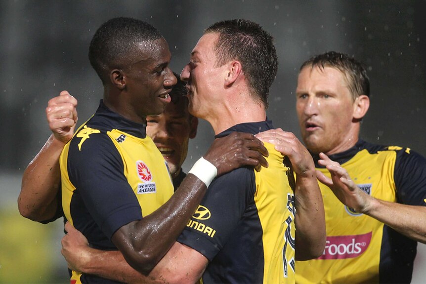 At the double ... Mitchell Duke lifted the pressure off of Central Coast with two goals against the Melbourne Victory.