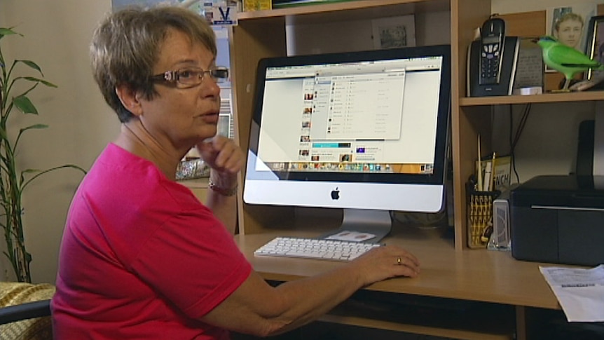 Mila Pinko at her computer