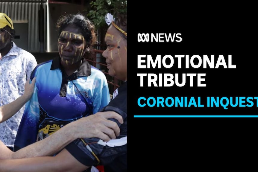Emotional Tribute, Coronial Inquest: Three women embrace. Two of the women have traditional face paint.