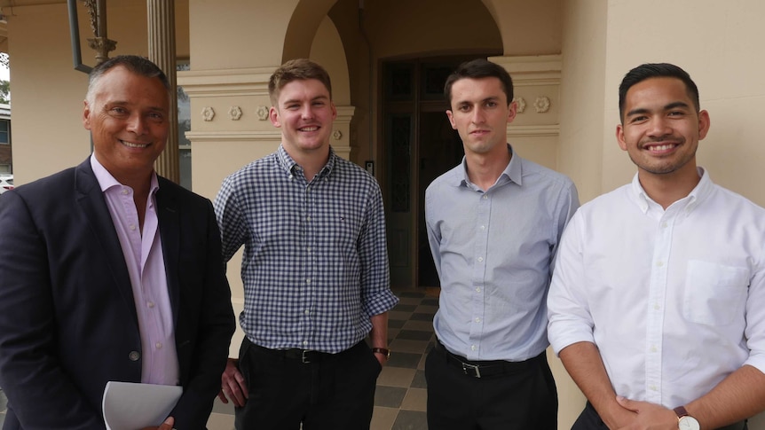 Stan Grant with trainee priests Joe Murphy, Jack Green and Chris Del Rosario