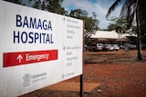 sign  for hospital with building in background in remote Cape York community