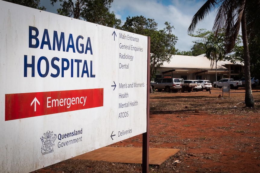 sign  for hospital with building in background in remote Cape York community