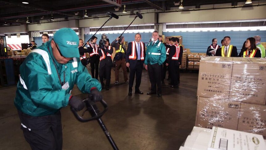 Tony Abbott visits Toll Express warehouse in Tokyo