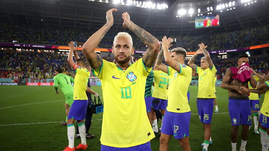 Neymar and Brazil teammates applaud fans after beating South Korea at the Qatar FIFA World Cup.