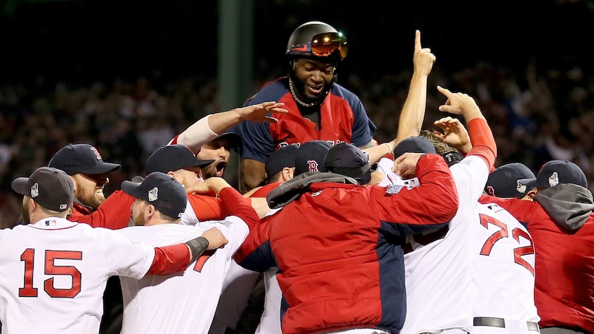 Sweet victory ... The Red Sox celebrate their World Series triumph