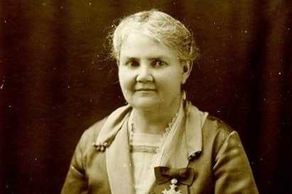 A sepia toned image of a woman