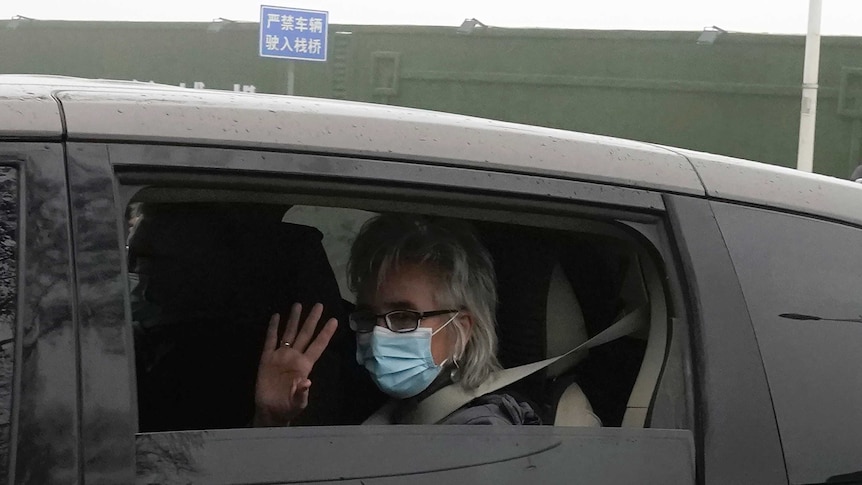 Marion Koopmans of a World Health Organization team arrives at the Hubei Center for Disease Control and Prevention.