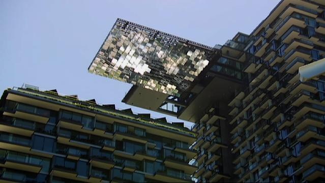 External of building, view of panels reflecting sunlight