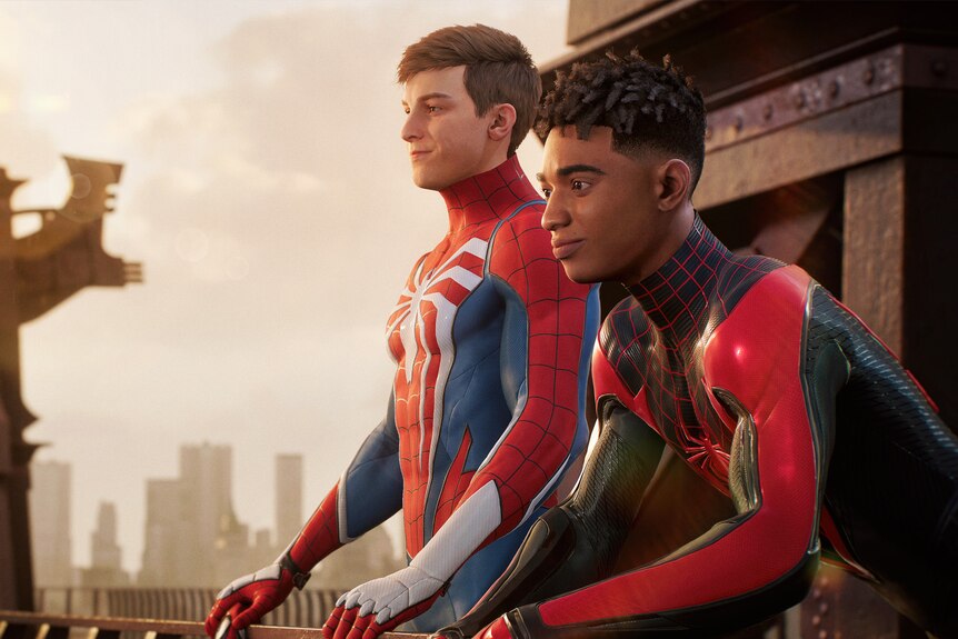 Two young men in Spider-Man costumes look over a balcony