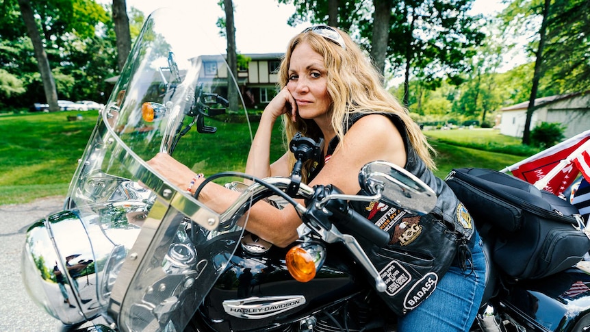 Londa on her motorcycle.