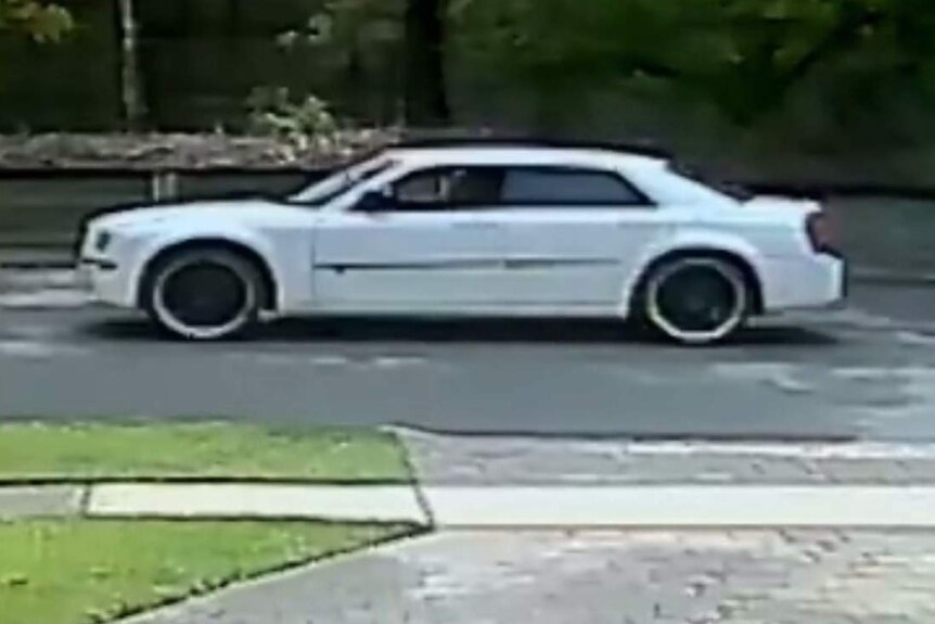 A white 300 Chrysler captured on security camera following Samuel Thompson's Ford Mustang at Bald Hills on March 7, 2017.