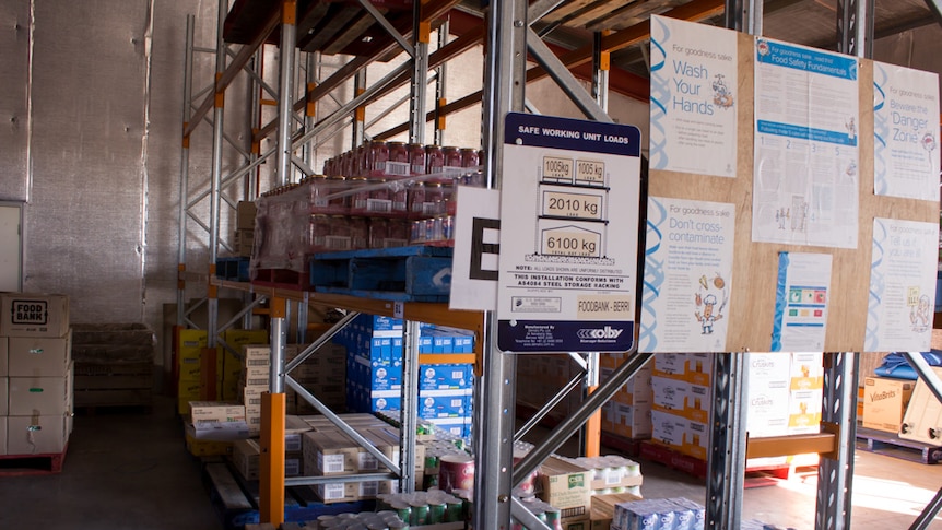 Food lining shelves of Foodbank Riverland