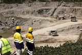 Machinery and workers on site at the Calabar site, Nigeria, of Australian mining company Macmahon Holdings.