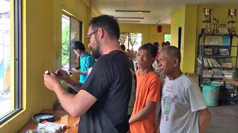 Professional scissor-maker Pete Walstab shares his skills with some local Filipino men.