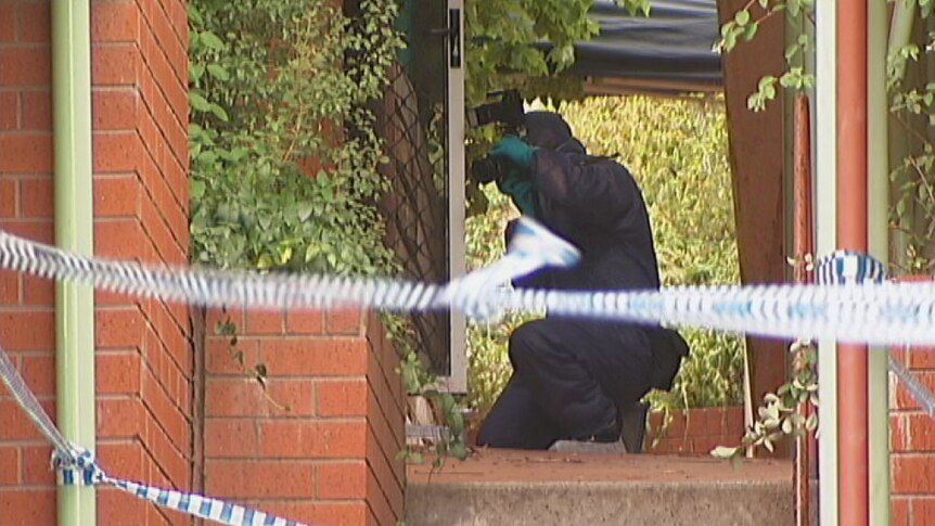 Forensic team inspects units in Phillip where Miodrag Gajic was found dead in January 2014