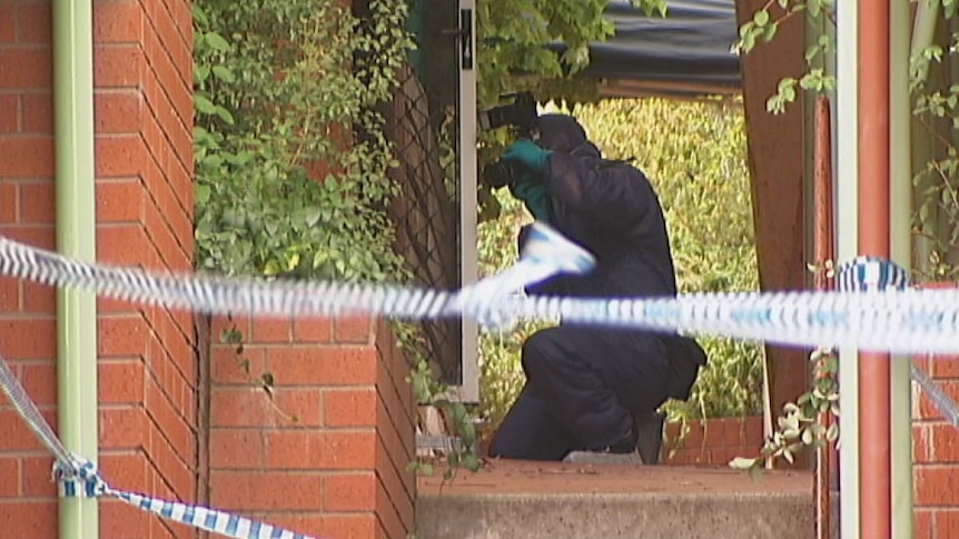 Forensic team inspects units in Phillip in Canberra's south where Miodrag Gajic, 71, was found dead in January 2014.