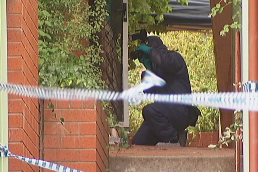 Forensic team inspects units in Phillip in Canberra's south where Miodrag Gajic, 71, was found dead in January 2014.