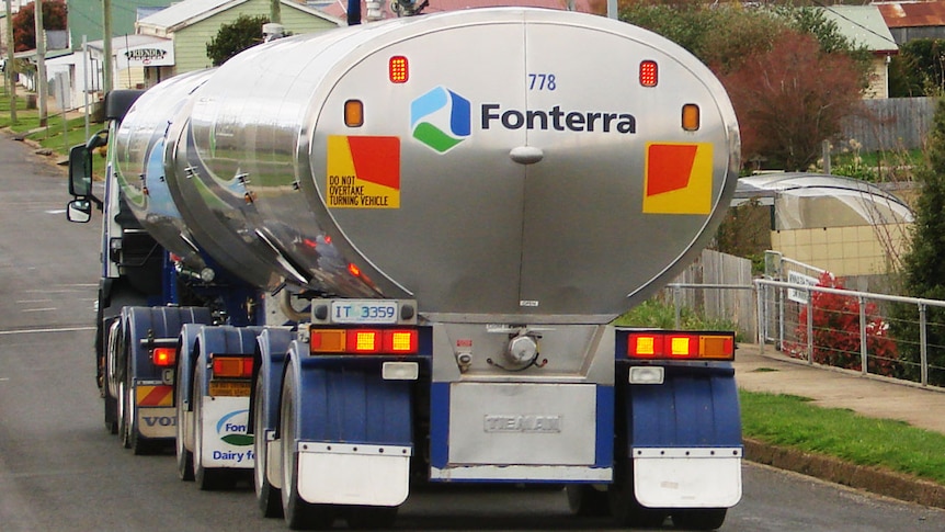 Standard B-Double milk tanker seen rear-on in Winnaleah's main street.