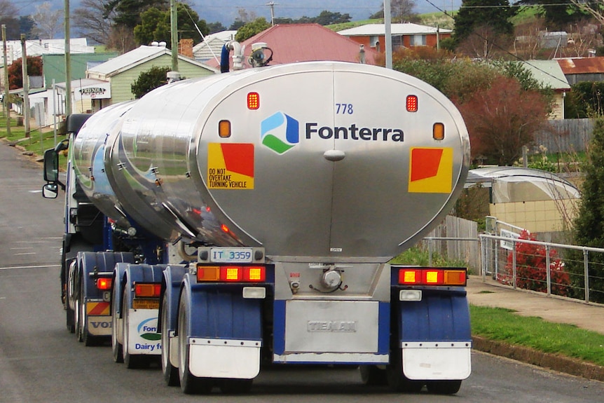 Standard B-Double milk tanker seen rear-on in Winnaleah's main street.