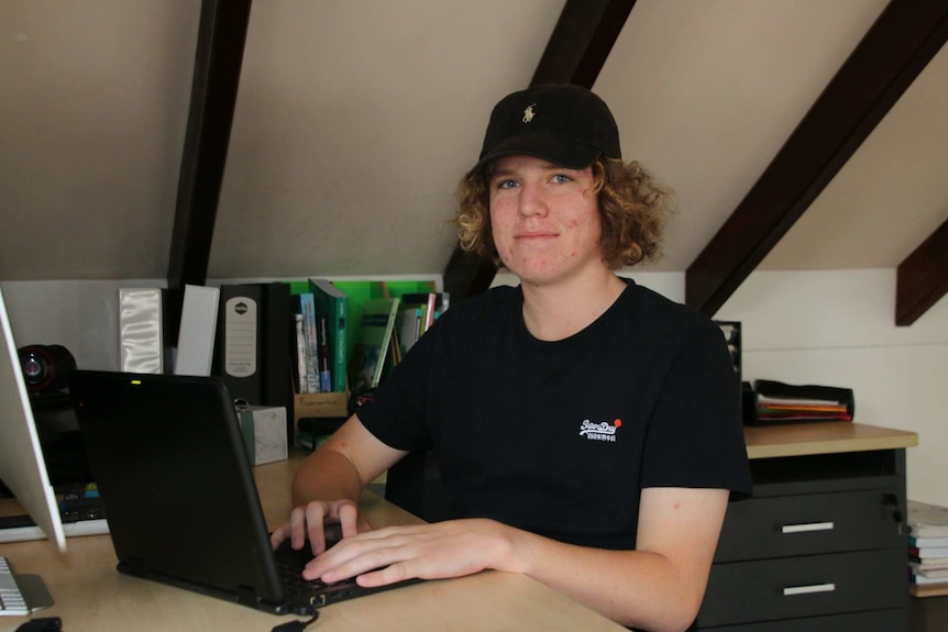 James Silsbury sitting at a computer.