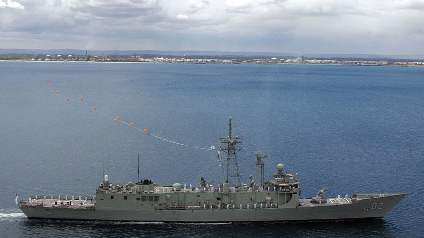HMAS Canberra sails up Cockburn Sound