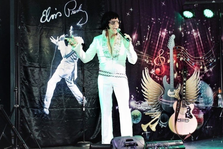 Elvis impersonator white suit
