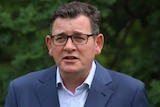 A picture of Victorian Premier Daniel Andrews holding an outdoor press conference.