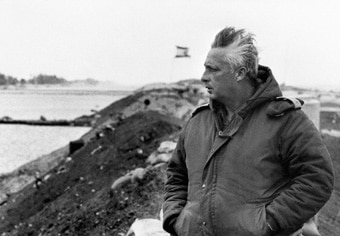 Israeli general Ariel Sharon stands on the right bank of the Suez Canal a few days before he left the army.