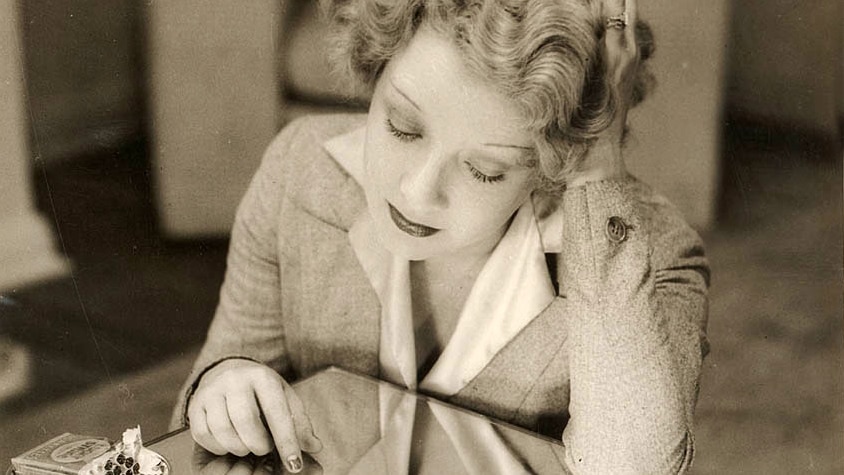 Black and white photo of sad 1930s lady