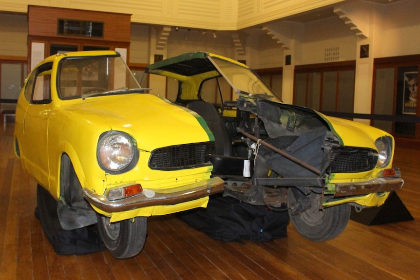 The split car from the 1986 film Malcolm on display at the National Film and Sound Archive