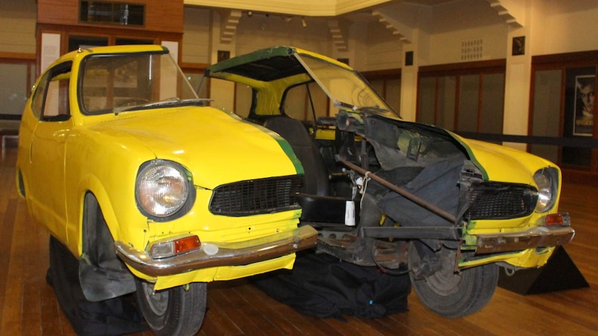 The split car from the 1986 film Malcolm on display at the National Film and Sound Archive