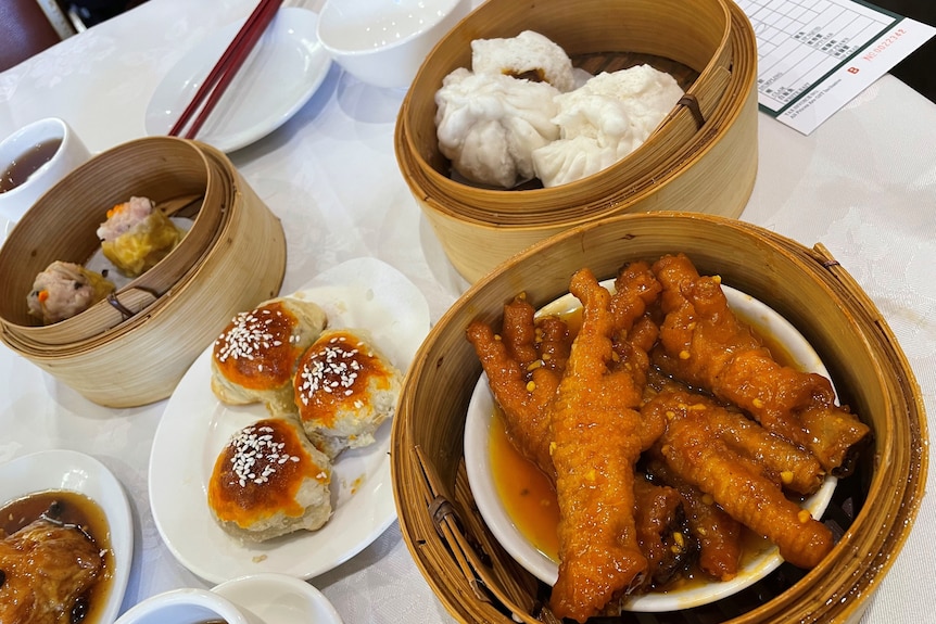 Various dim sum dishes on the table