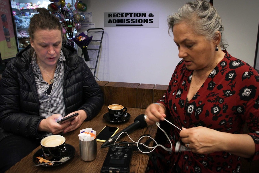 Two women sitting together