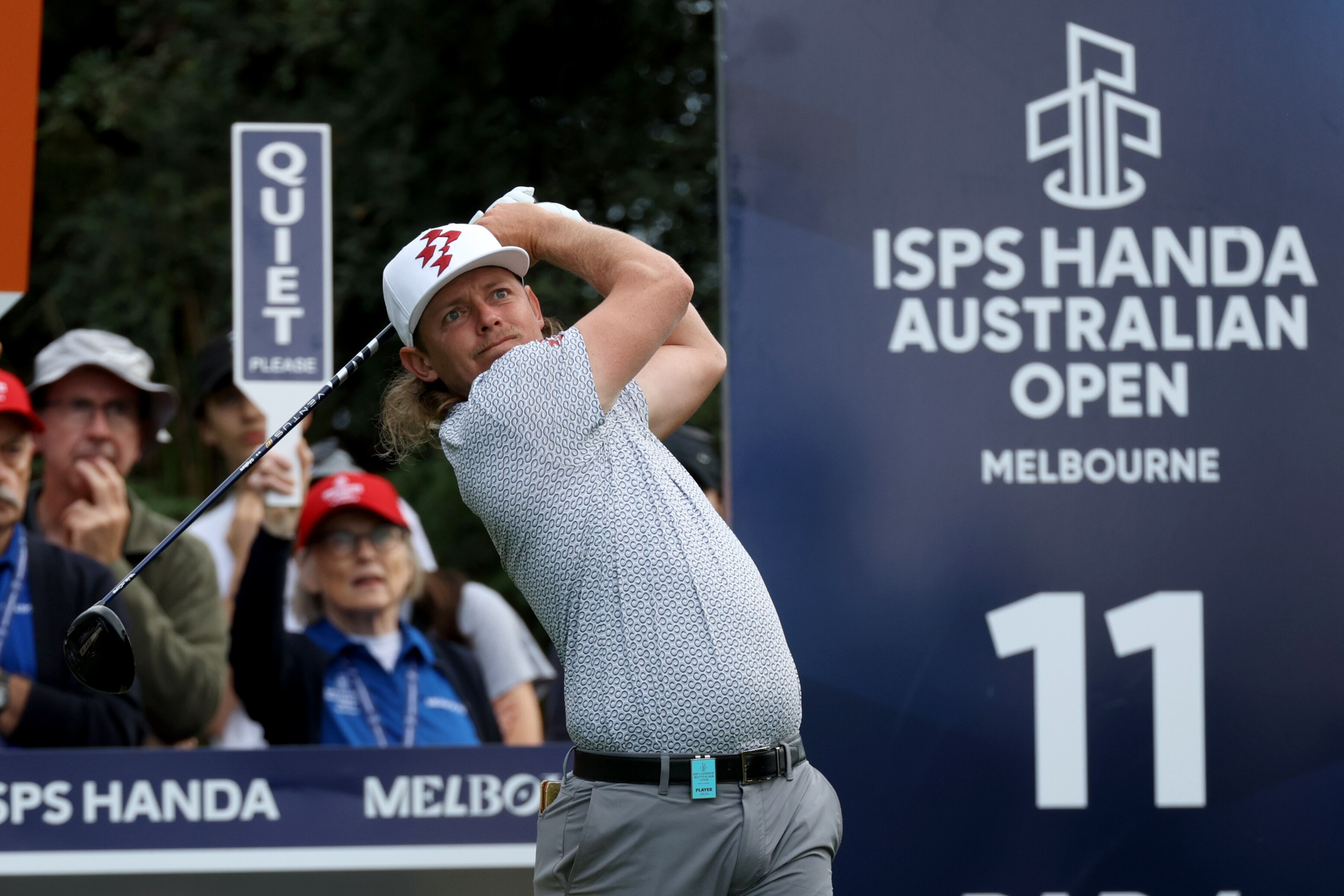 Cameron Smith on the follow-through of a drive off the tee box at the Australian Open.